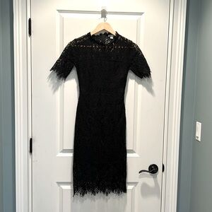 Black lace cocktail dress. Size XS. miami brand. Worn 2x!